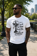 African American man wearing a white Philippians 4:13 Christian T-shirt in a modern city park.